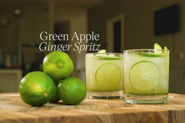Green Apple Ginger Spritz Drink and limes